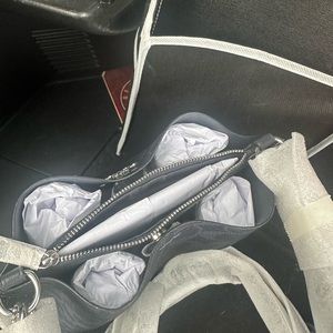 Small crossbody by COACH. Brand new with tags.